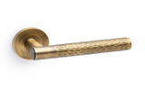 Alexander & Wilks Spitfire Hammered Lever on Round Rose - Italian Brass Image 1 Thumbnail