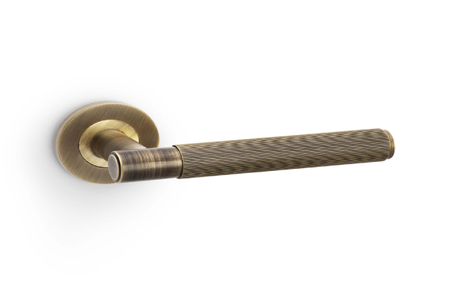 View Alexander & Wilks Spitfire Reeded Lever on Round Rose - Antique Brass offered by HiF Kitchens