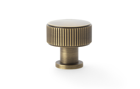 View Alexander & Wilks Lucia Reeded Cupboard Knob - Antique Brass - 29mm offered by HiF Kitchens