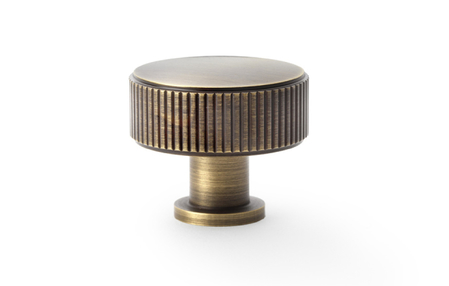 View Alexander & Wilks Lucia Reeded Cupboard Knob - Antique Brass - 35mm offered by HiF Kitchens