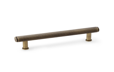 View Alexander & Wilks Crispin Knurled T-bar Cupboard Pull Handle - Antique Brass - Centres 128mm offered by HiF Kitchens