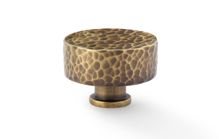 View Alexander & Wilks Leila Hammered Cupboard Knob - Antique Brass - 35mm offered by HiF Kitchens