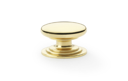 View Alexander & Wilks Waltz Round Cupboard Knob on Stepped Rose - Polished Brass - 32mm offered by HiF Kitchens