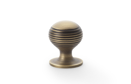 View Alexander & Wilks Caesar Cupboard Knob on Round Rose - Antique Brass - 25mm offered by HiF Kitchens