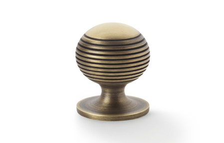 View Alexander & Wilks Caesar Cupboard Knob on Round Rose - Antique Brass - 32mm offered by HiF Kitchens