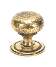 View 46026 - Aged Brass Hammered Mushroom Cabinet Knob 38mm FTA offered by HiF Kitchens