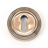 46119 - Polished Bronze Round Escutcheon (Beehive) - FTA Image 1 Thumbnail