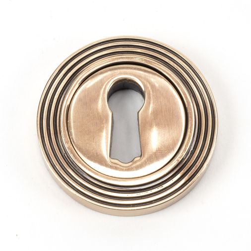 46119 - Polished Bronze Round Escutcheon (Beehive) - FTA Image 1
