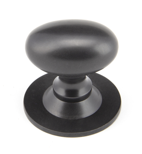 92035 - From The Anvil Aged Bronze Oval Cabinet Knob 40mm - FTA Image 1