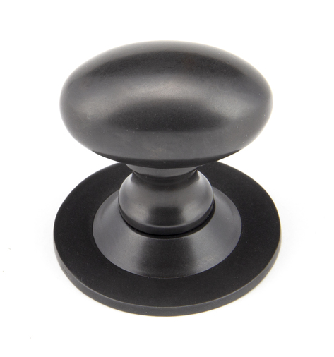 92036 - From The Anvil Aged Bronze Oval Cabinet Knob 33mm - FTA Image 1