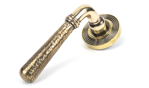 View 46071 - Aged Brass Hammered Newbury Lever on Rose Set (Beehive) FTA offered by HiF Kitchens