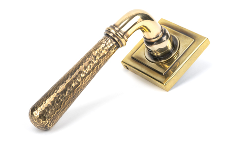 View 46072 - Aged Brass Hammered Newbury Lever on Rose Set (Square) FTA offered by HiF Kitchens