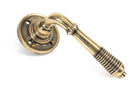 View 50086 - Aged Brass Reeded Lever on Rose Set - U - FTA offered by HiF Kitchens