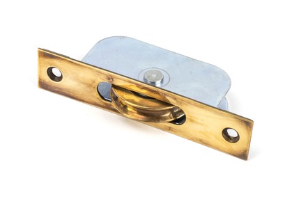 View 83919 - Aged Brass Square Ended Sash Pulley 75kg FTA offered by HiF Kitchens