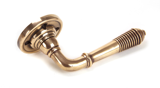 View 91917 - Polished Bronze Reeded Lever on Rose Set - FTA offered by HiF Kitchens
