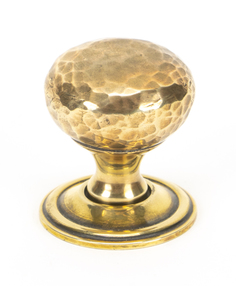 View 46021 - Aged Brass Hammered Mushroom Cabinet Knob 32mm FTA offered by HiF Kitchens