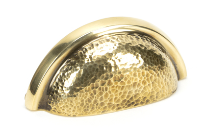 View 46041 - Aged Brass Hammered Regency Concealed Drawer Pull FTA offered by HiF Kitchens